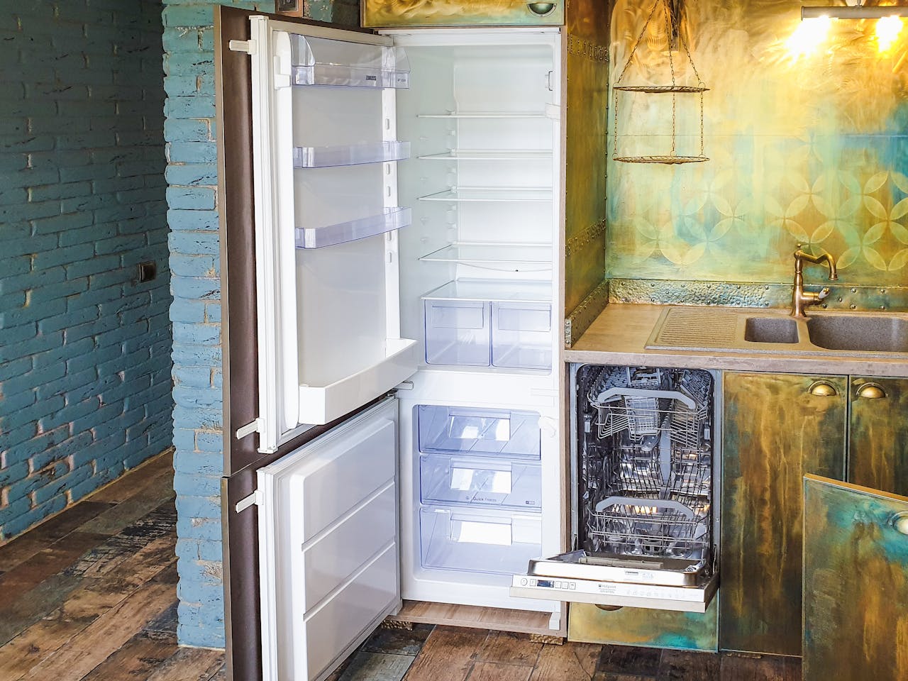 Crafting Captivating Headlines: Your awesome post title goes here Stylish kitchen interior featuring an open refrigerator and dishwasher, showcasing contemporary design.